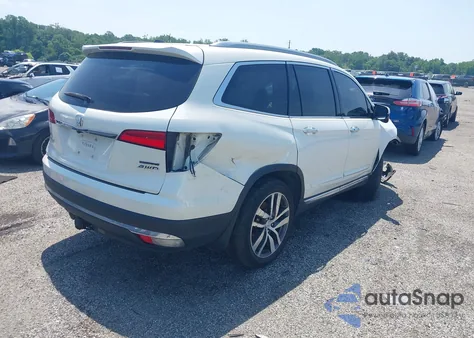2016 Honda Pilot Touring z USA, uszkodzony, nr VIN 5FNYF6H92GB053298